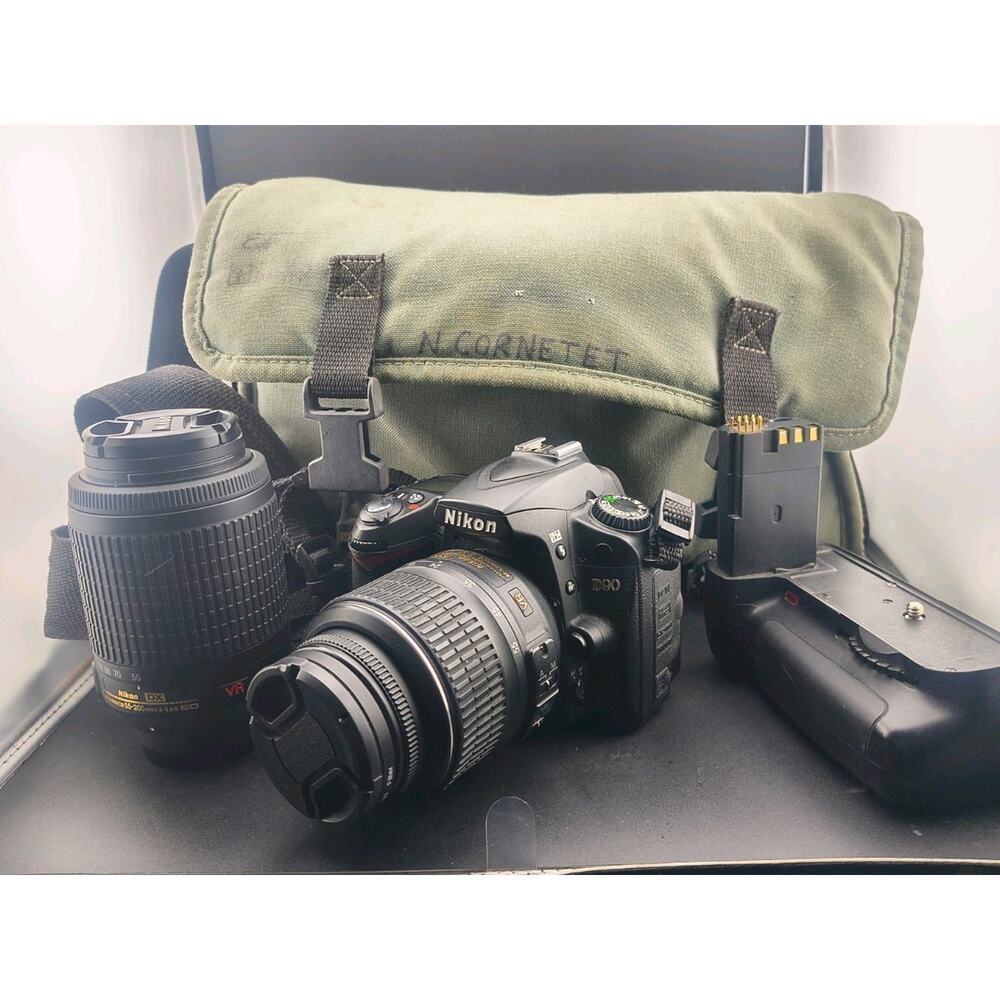 Nikon D90 DSLR Camera Bundle - 18-55mm & 55-200mm VR Lenses, Battery Grip, Bag